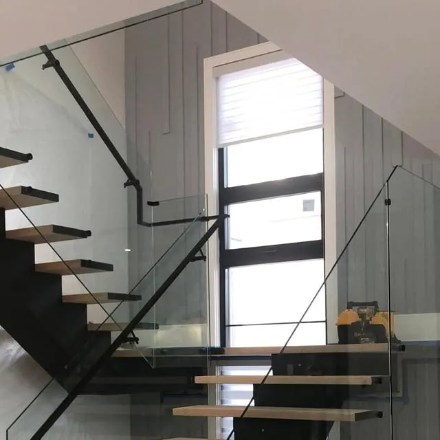 Frameless glass stair railing installation